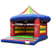 Commercial grade hot sale pointed roof bouncy castle prices